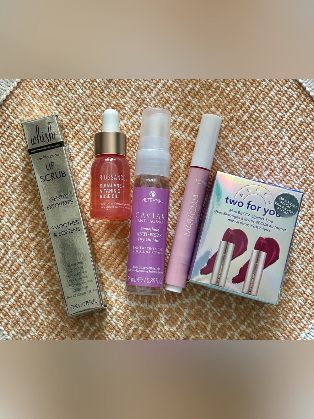 Bundle of lip, skin, and hair products (tarte, biossance, Becca, + more)
